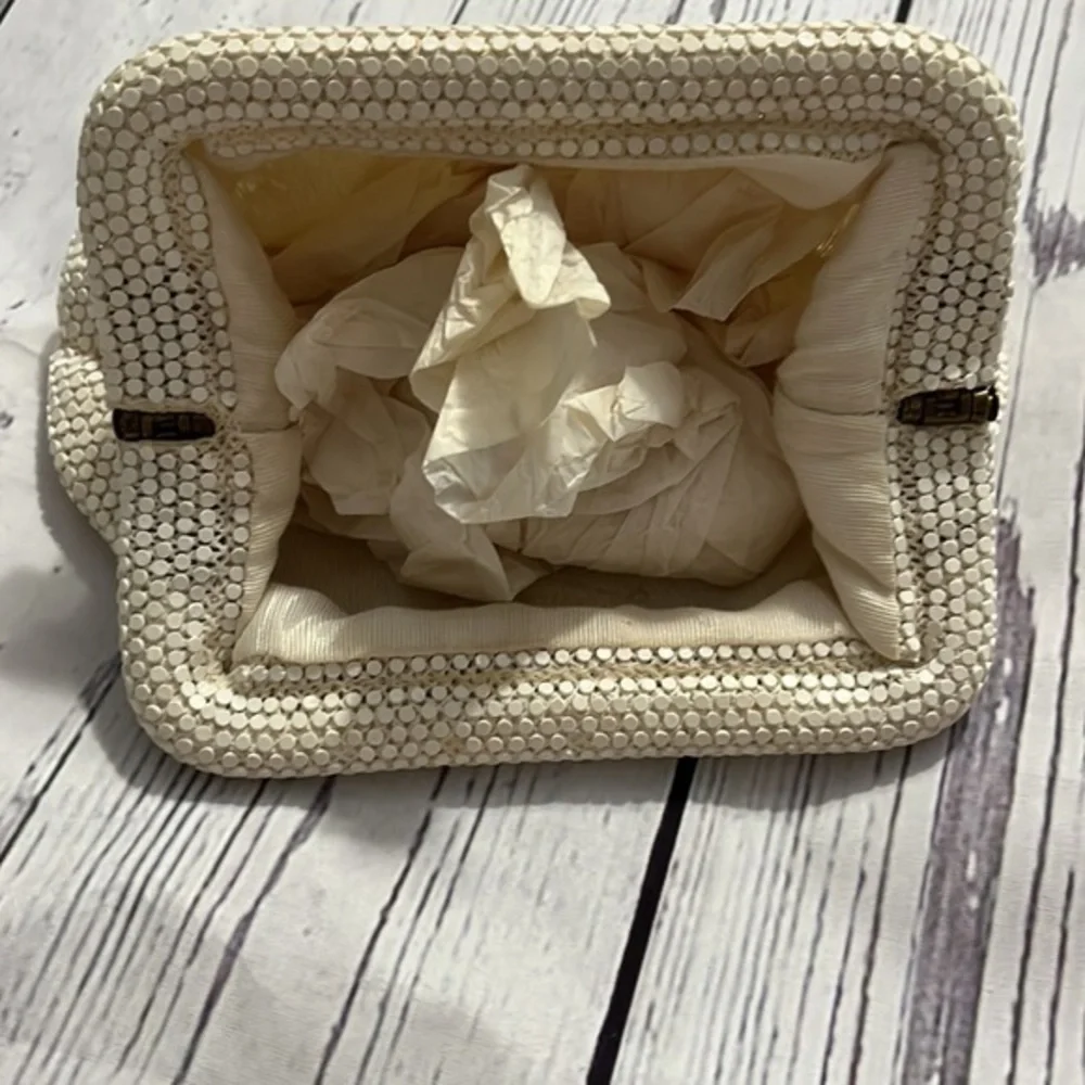 Dainty special occasion clutch with snap hinge closure cream